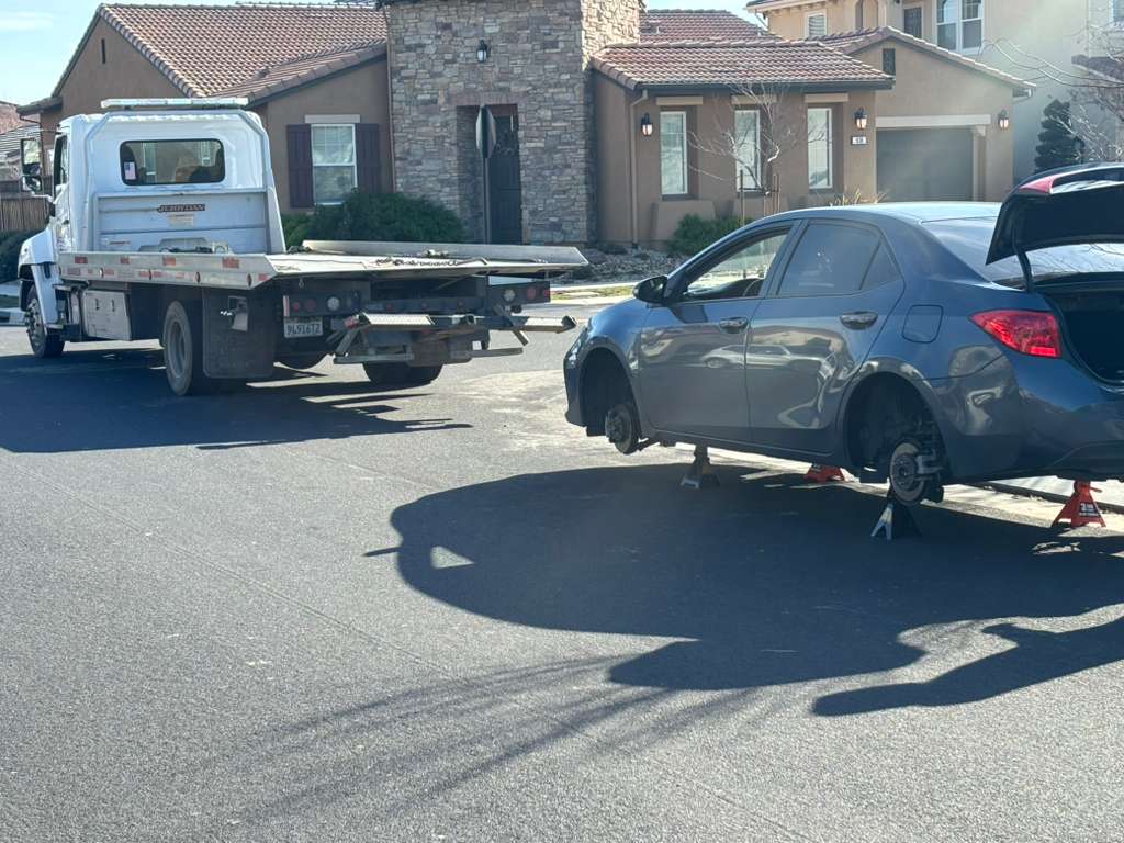 Rite Away Tow flatbed tow truck dispatched on an emergency call in Tracy, California
