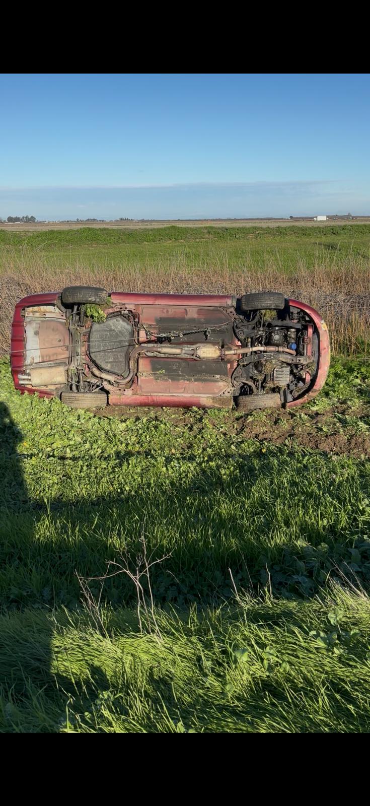 Winch-out recovery pulling a vehicle out of mud near Tracy, CA