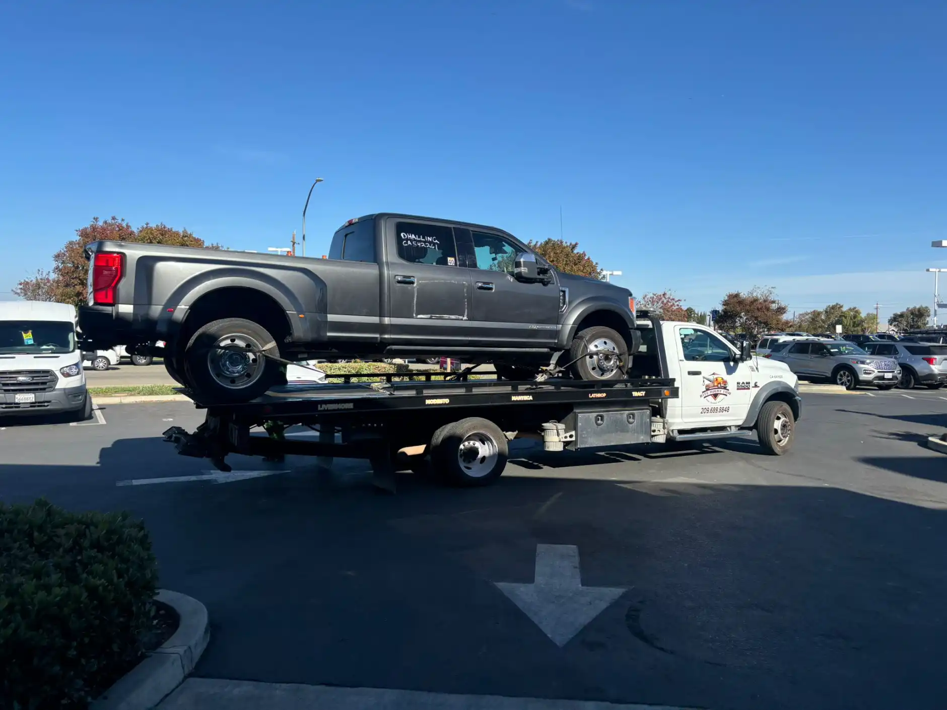 Rite Away Tow flatbed tow truck in action